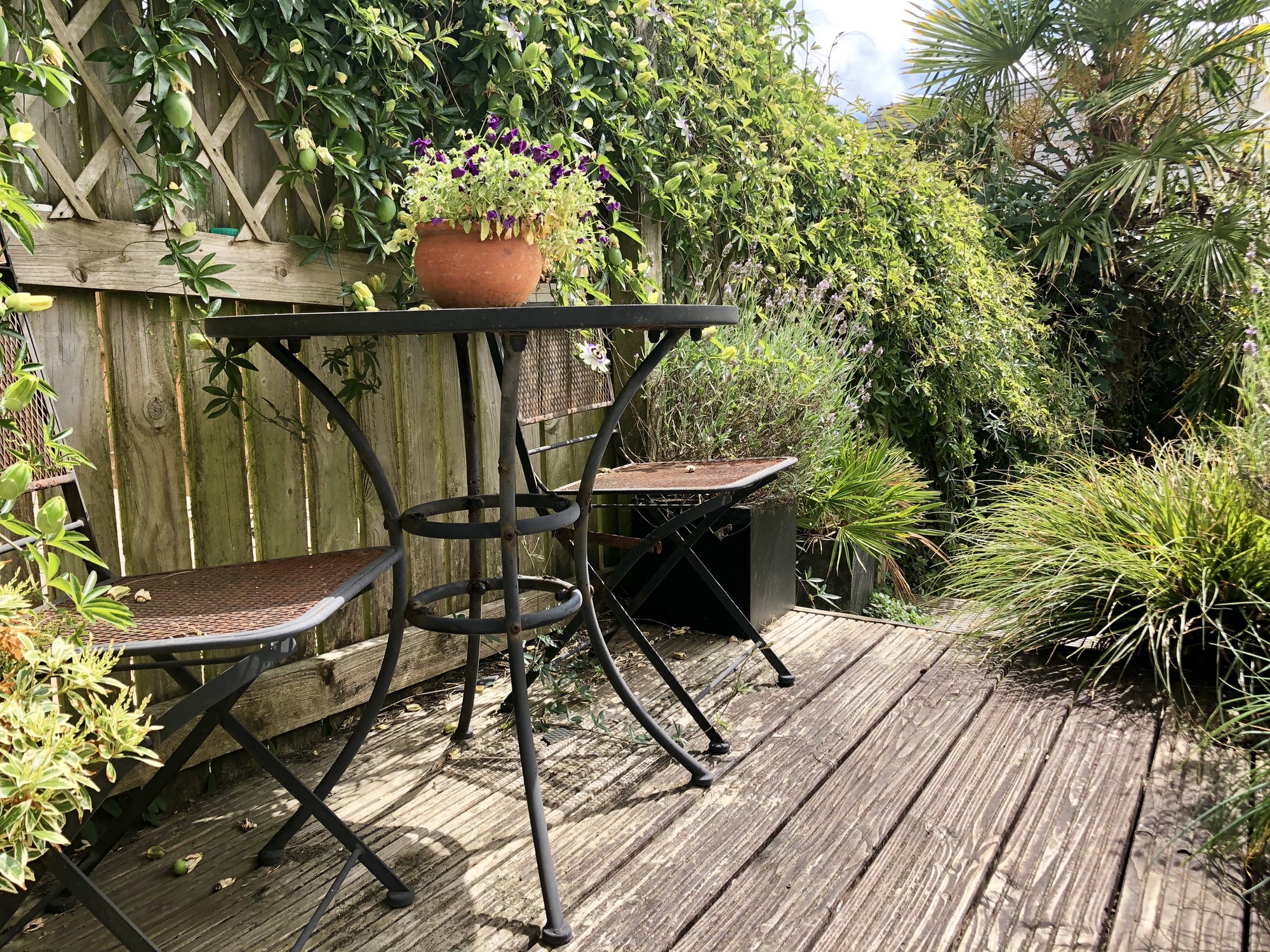 Bistro table and chairs on decking